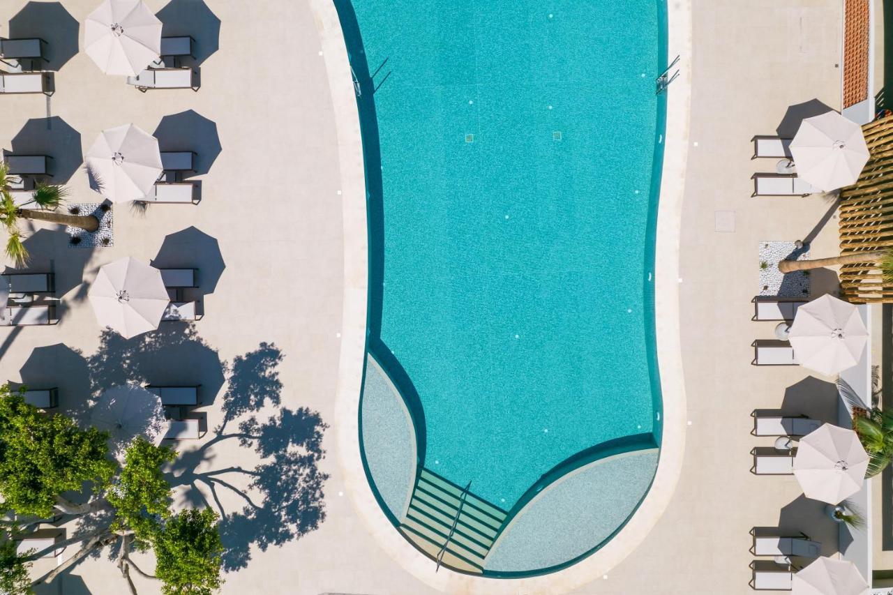 Utopia Blu Hotel ตีกากี ภายนอก รูปภาพ